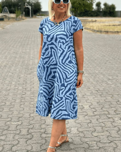 Nelia - Zomerjurk met ronde hals en mooie print