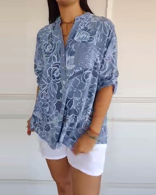 Kélya | Losse blouse met bloemenprint en pailletten