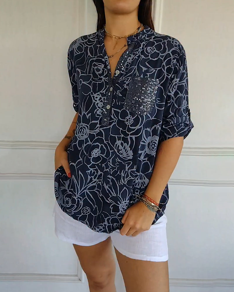 Kélya | Losse blouse met bloemenprint en pailletten