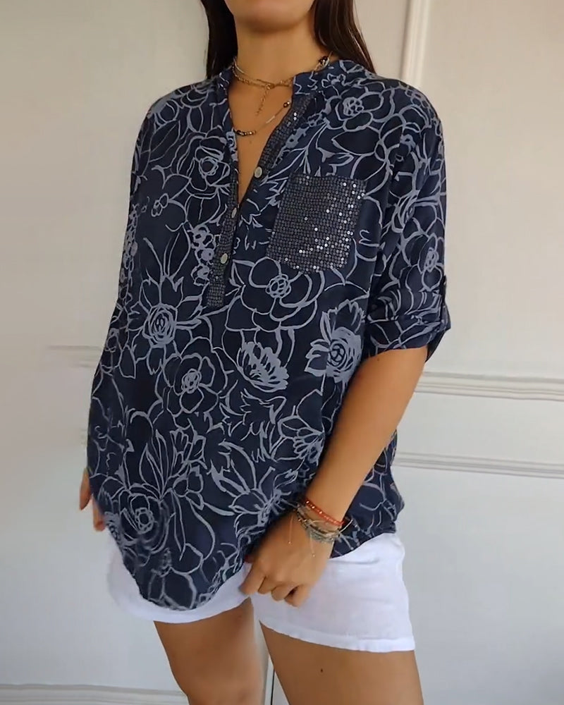 Kélya | Losse blouse met bloemenprint en pailletten