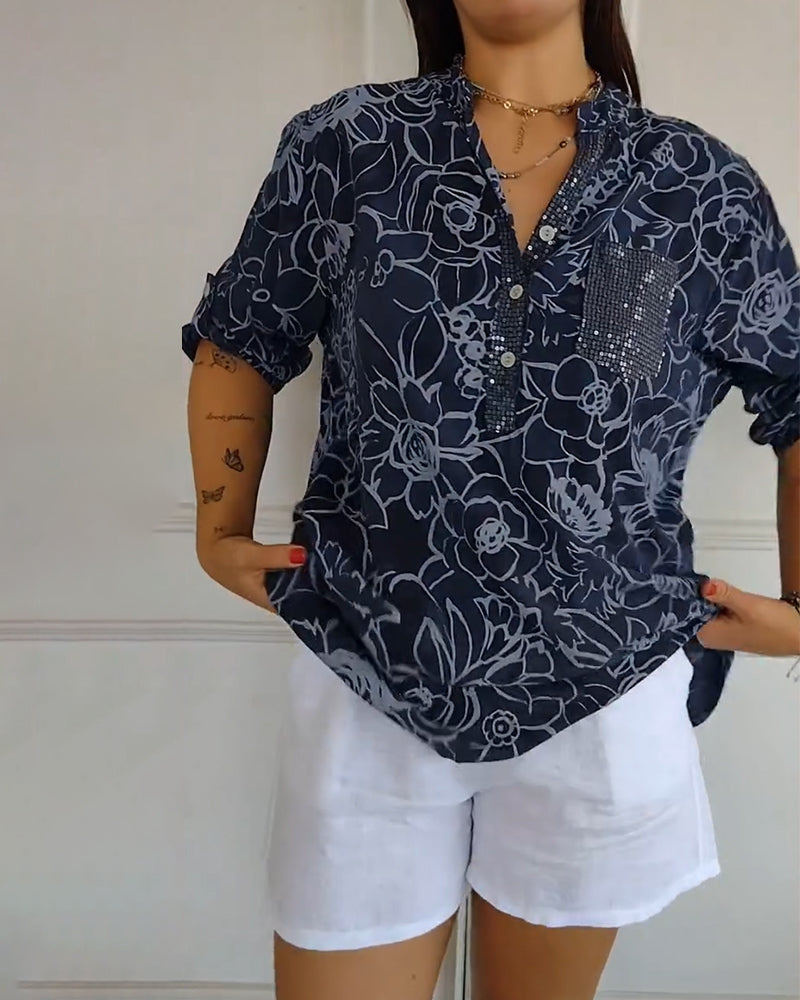 Kélya | Losse blouse met bloemenprint en pailletten