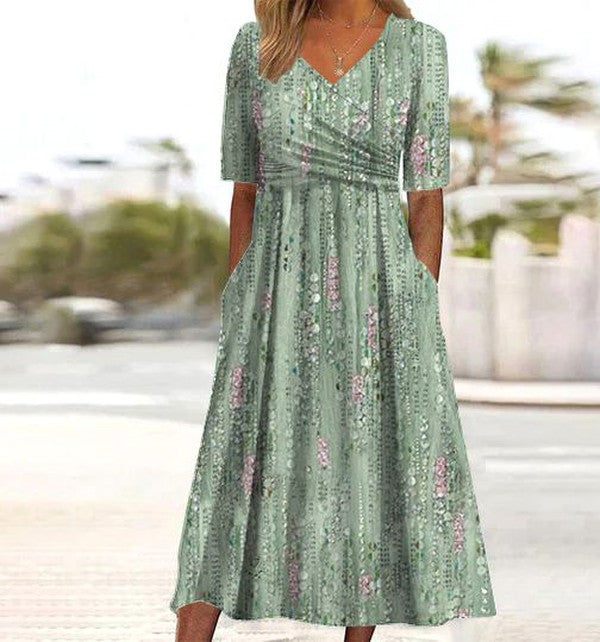 Mary - Midi-jurk met botanische print die de buik goed verhult
