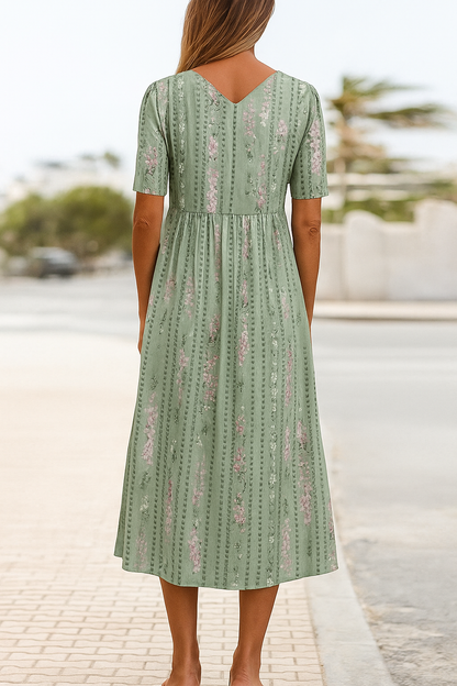 Mary - Midi-jurk met botanische print die de buik goed verhult